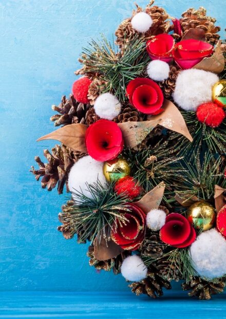 Christmas wreath on blue background