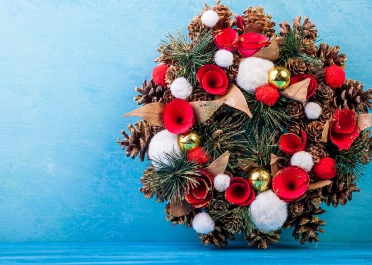 Christmas wreath on blue background
