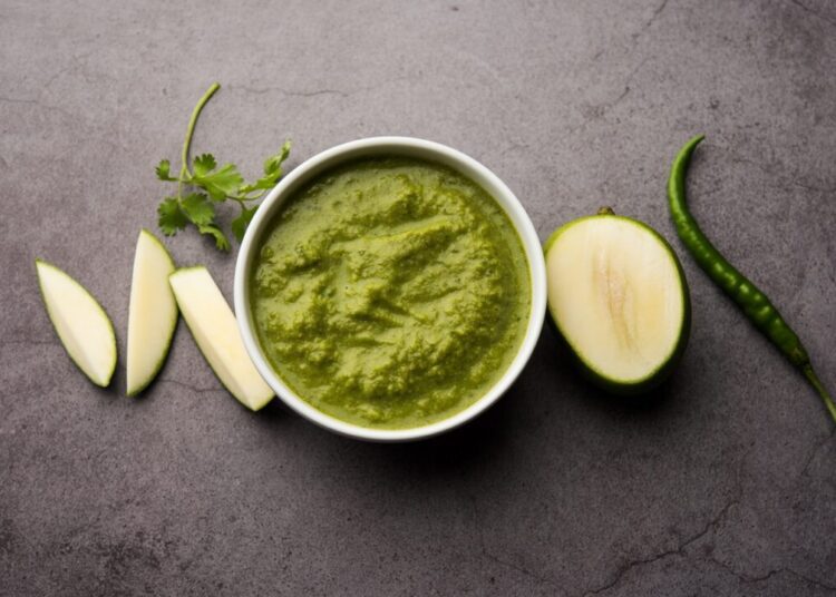Raw Mango Chutney is a tangy dip made using coriander and raw mangoes and chilli